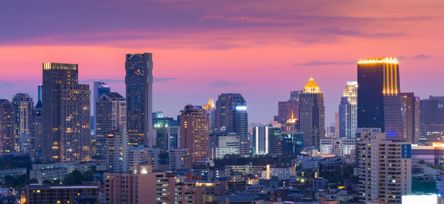 Dramatic,Cloud,And,Sky,After,Sunset,,City,Office,Building,Lights